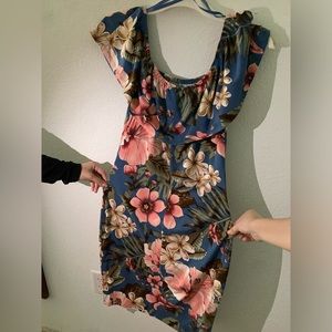 A flowery off the shoulder dress